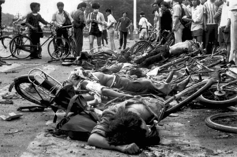 The bodies of dead civilians lie among mangled bicycles near Beijing's Tiananmen Square in this June 4, 1989 file photo.  Credit: AP