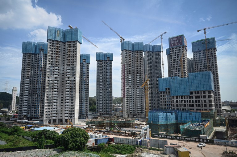 This photo taken on July 13, 2022, shows the under-construction housing complex by Chinese property developer Poly Group in Dongguan, in China's southern Guangdong province. Credit: AFP