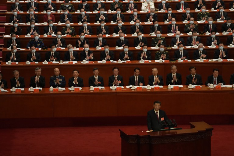 Delegates applaud as Chinese President Xi Jinping speaks during the opening ceremony of the 20th National Congress of China's ruling Communist Party held at the Great Hall of the People in Beijing, China, Oct. 16, 2022. Credit: AP