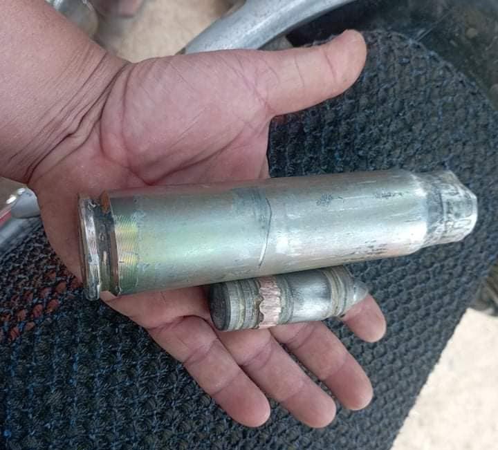 A spent cartridge and round found after the first attack at Pa Zi Gyi village in Sagaing’s Kanbalu township, Myanmar, April 11, 2023. Credit: Citizen journalist
