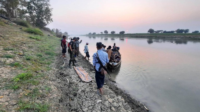 Villagers in Myinmu township, Sagaing region, move the bodies of people killed by Myanmar military troops on Nyaung Yin island, March 3, 2023. Credit: Citizen journalist