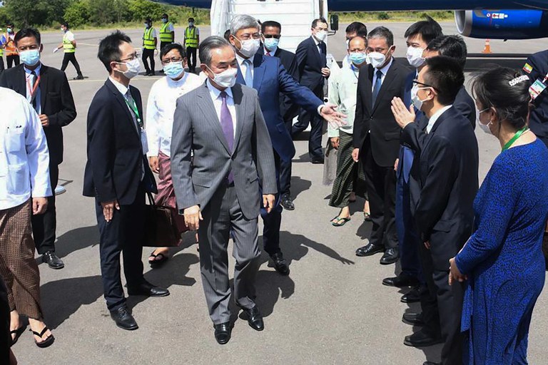 In this handout photo Chinese foreign minister Wang Yi, center is welcomed at Myanmar's Nyaung-U Airport to attend a foreign ministers' meeting of the Lancang-Mekong Cooperation mechanism on July 2, 2022 Credit: Myanmar Military/AFP