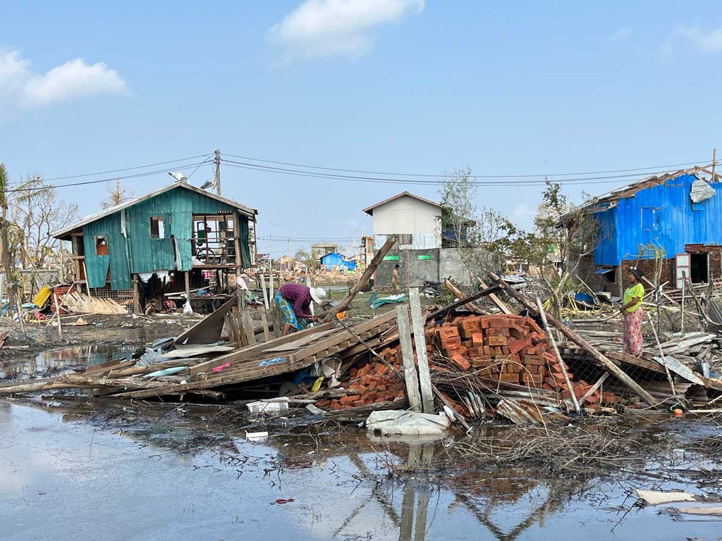 Villagers gather materials to rebuild in Kyay Taw Paik Seik five days after Cyclone Mocha. (Photo: RFA)