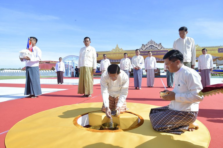 Senior Gen. Min Aung Hlaing, center, head of the military council, puts jewelry at point of victory, auspicious ground, during consecration ceremony at the sitting Maravijaya Buddha statue made with marble rock, Sunday, July 23, 2023, in Naypyitaw, Myanmar. Credit: Military True News Information Team via AP