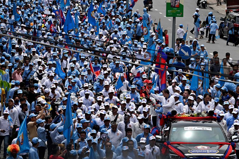 Hun Manet greets supporters during a campaign rally in Phnom Penh in July 2023. Prime Minister, Hun Manet, will meet with Cambodia’s aggravated private sector for his administration's first Government-Private Sector Forum in November which his nascent government has been preparing for months. Credit: Tang Chhin Sothy/AFP