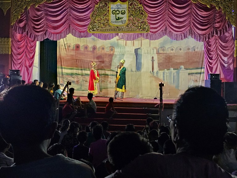 People gather to watch Ramayana, a traditional drama being performed. (RFA photo)