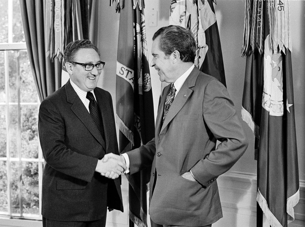 U.S. President Richard M. Nixon congratulates Secretary of State Henry Kissinger on his 1973 Nobel Peace Prize award, at the White House in Washington, D.C., Oct. 16, 1973. (AP)