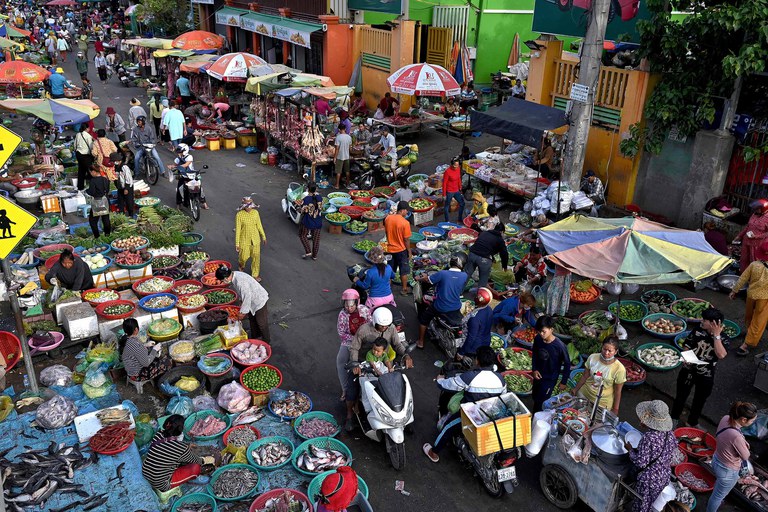 Fresh produce market in Phnom Penh, June 13, 2023. Despite decades of tens of millions of dollars being pumped into Cambodia’s NGO sector, there has never been an association created that specifically represents the interests of consumers. (Tang Chhin Sothy/AFP)