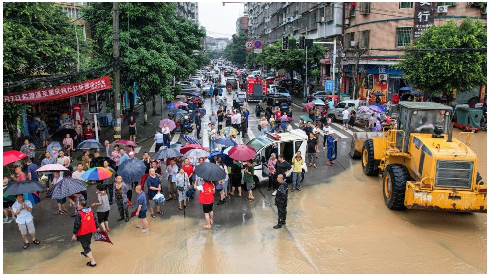 Large portions of China have been battered by heavy rains that have caused flooding and significant damage © STR / AFP/File ADVERTISING The bridge over a river in Shaanxi province's Shangluo buckled at