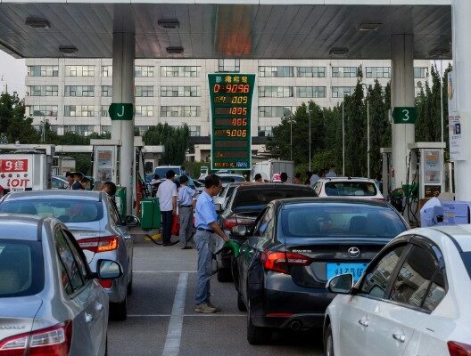 Despite huge petroleum reserves and discounted Iranian crude, China hiked retail fuel prices sharply in March 2026 amid soaring global oil from the Iran conflict. Explore the reasons and impacts.